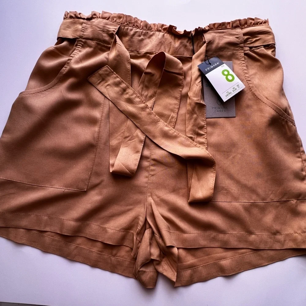 Dress shorts, yellow size 8 . PRIMARK CARES